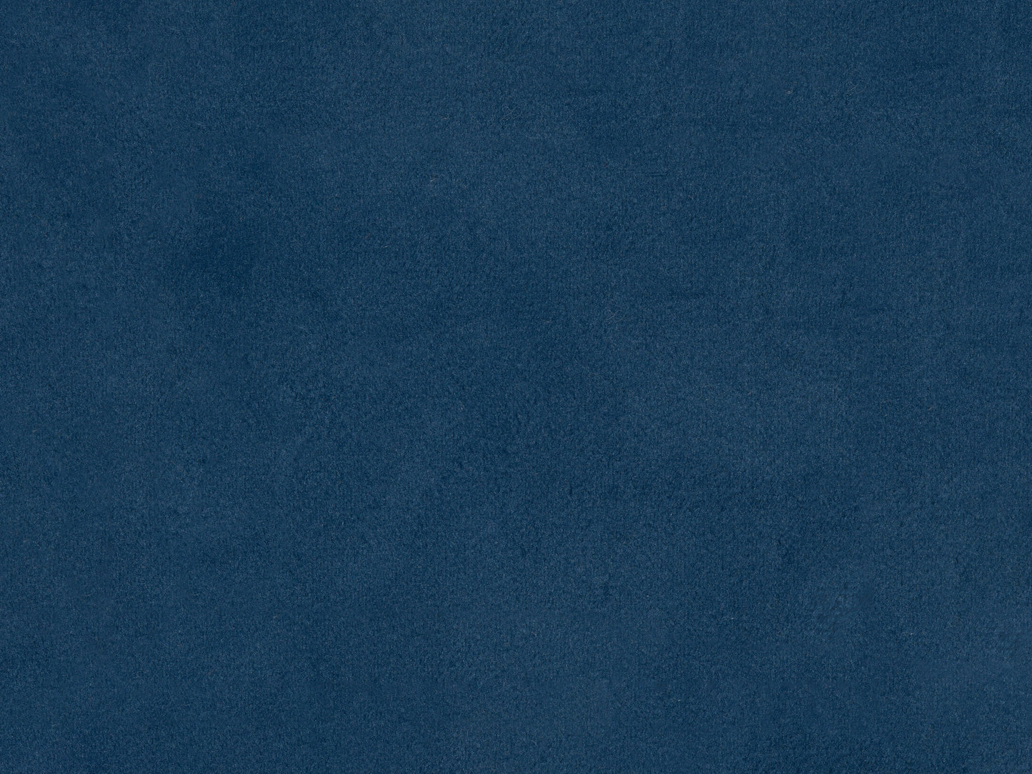 Navy blue velvet queen headboard with tufted design and plush texture.