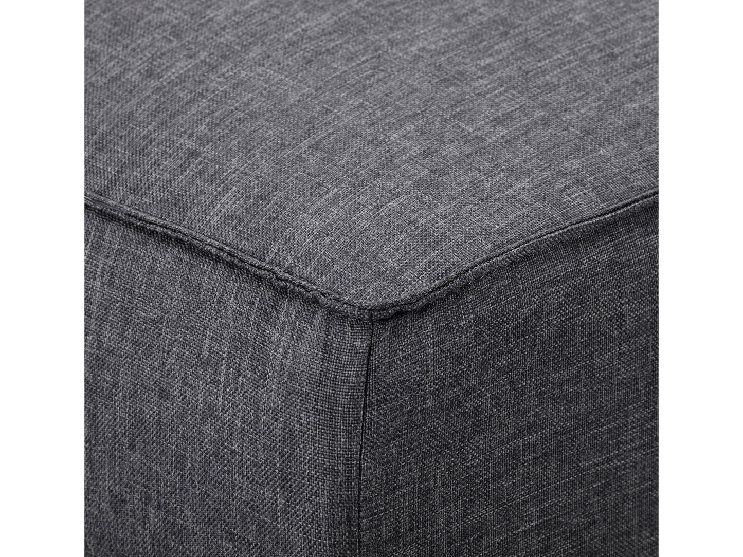 Dark grey futon sofa bed with tufted cushions, wooden legs, and a convertible design for modern living spaces.