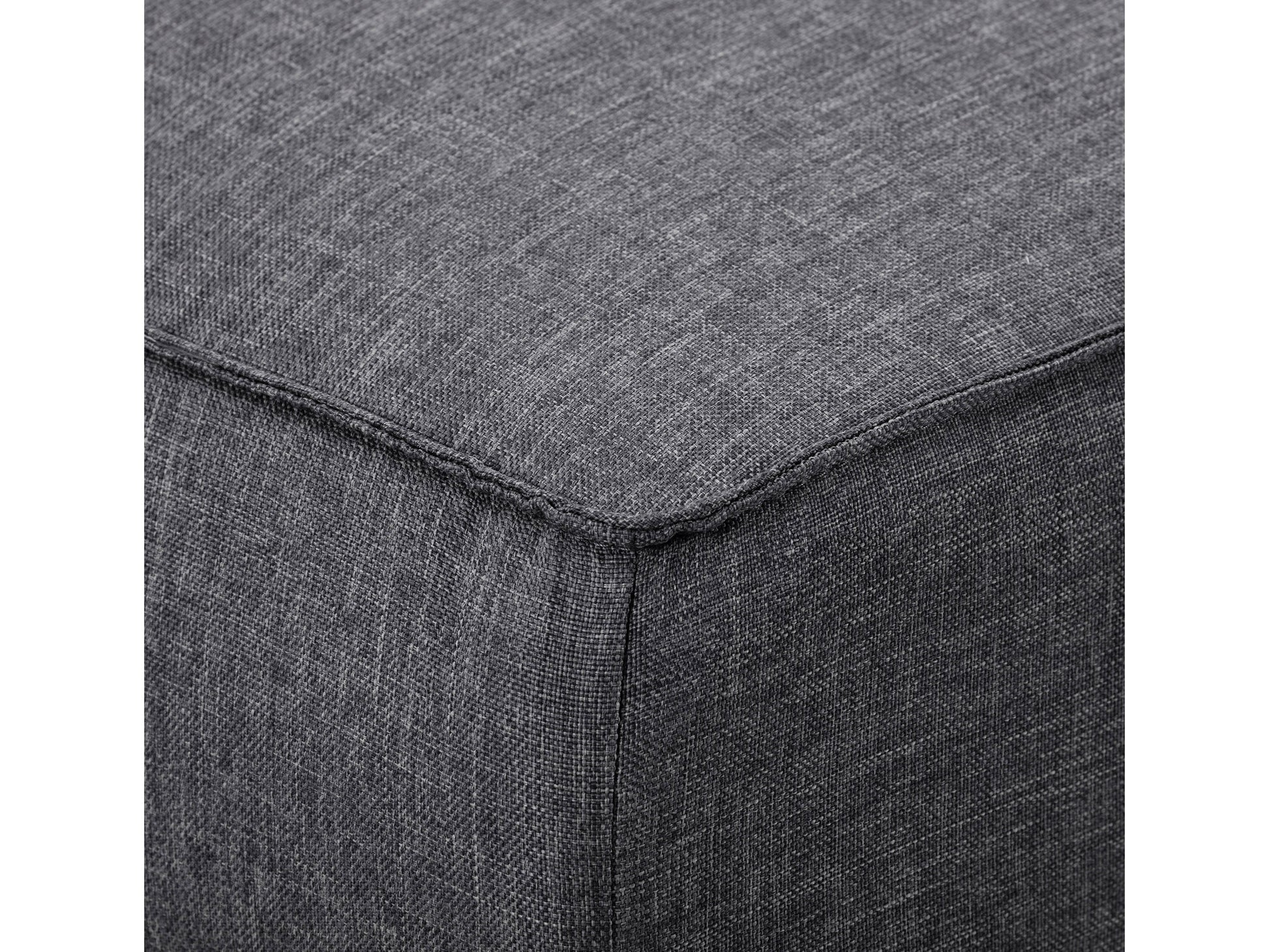 Dark grey futon sofa bed with tufted cushions, wooden legs, and a convertible design for modern living spaces.