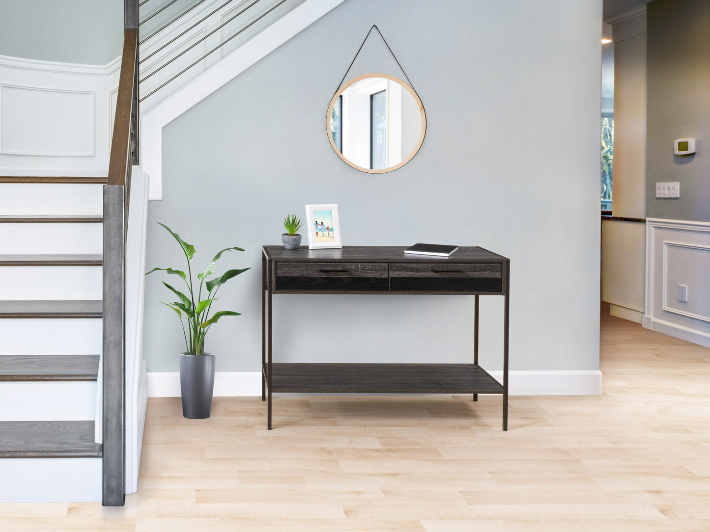 Rustic farmhouse console table with distressed white finish, natural wood top, and two spacious drawers with black metal handles. Perfect for entryways or living rooms, blending vintage charm with functional storage.