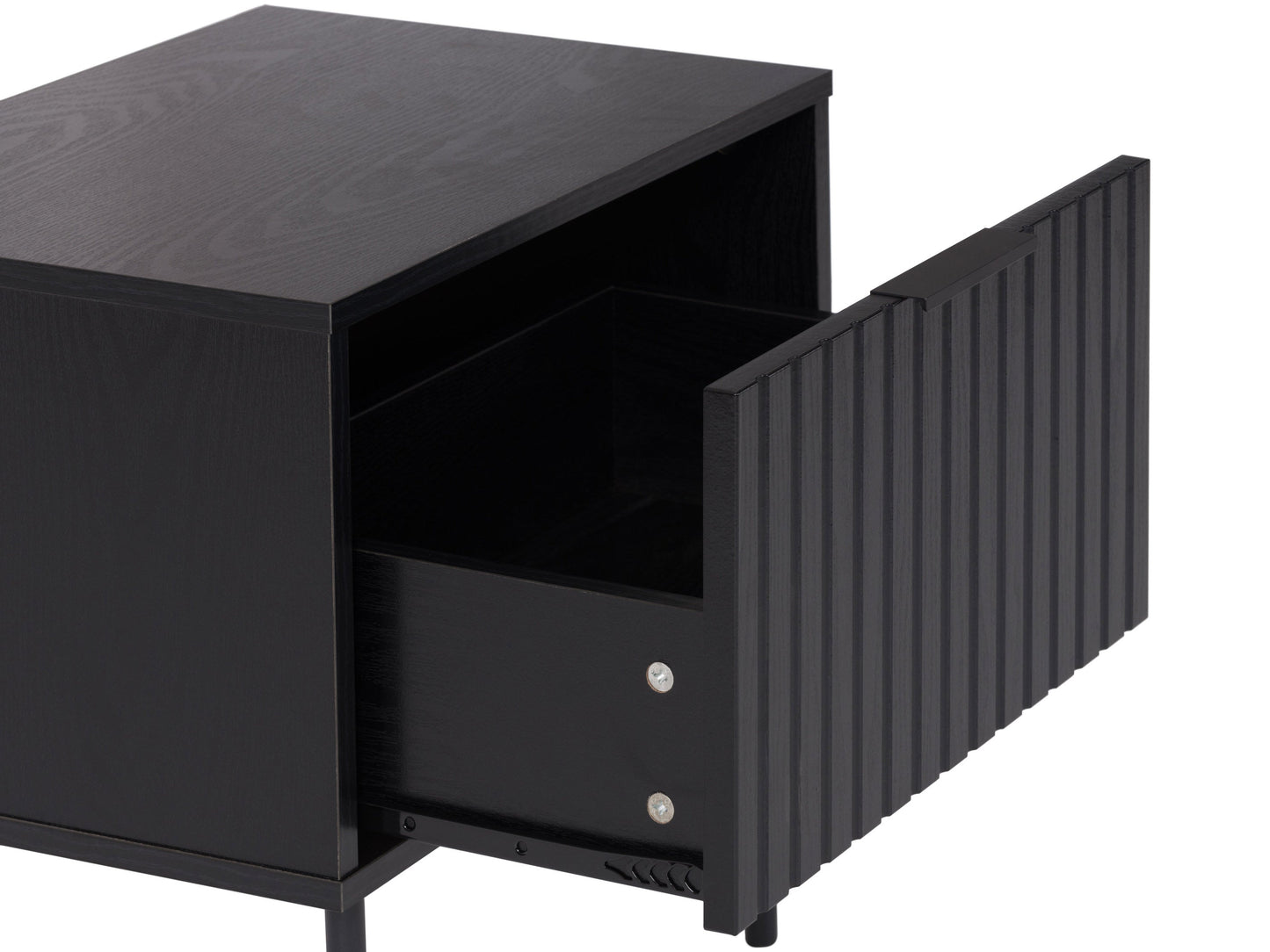 Black fluted side table with round top, ribbed texture, and sleek modern design.