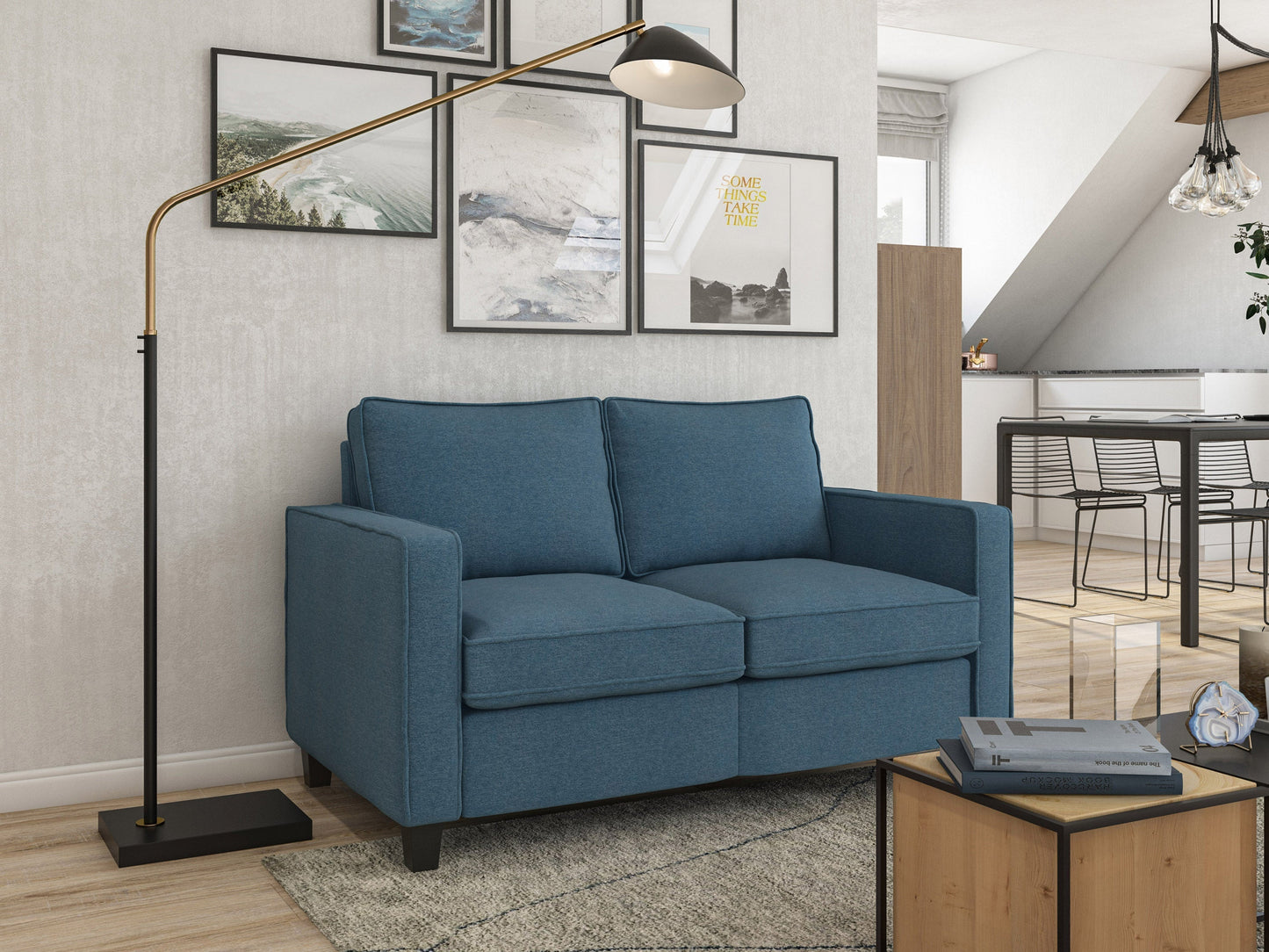 Blue 2 seater sofa loveseat with tufted cushions, wooden legs, and modern design.