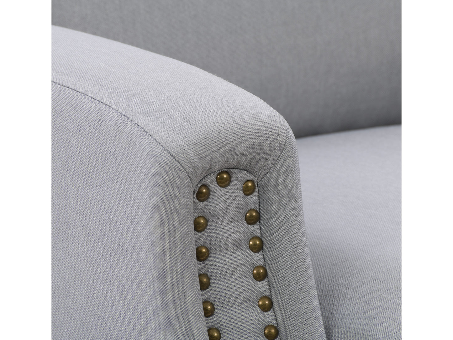 Brown reclining accent chair with tufted backrest, rolled arms, and nailhead trim. Upholstered in leather with a classic design, featuring a sturdy wooden frame and smooth reclining mechanism for ultimate comfort.