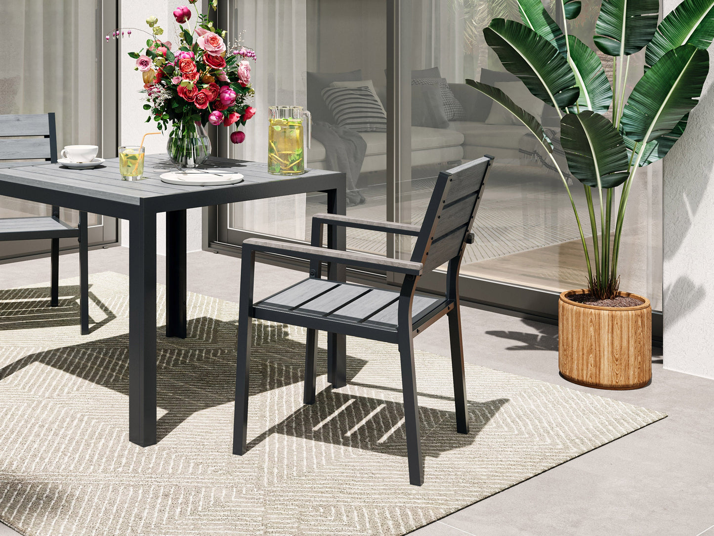 Set of 2 grey patio dining chairs with wooden legs and cushioned seats, ideal for outdoor dining and relaxation.