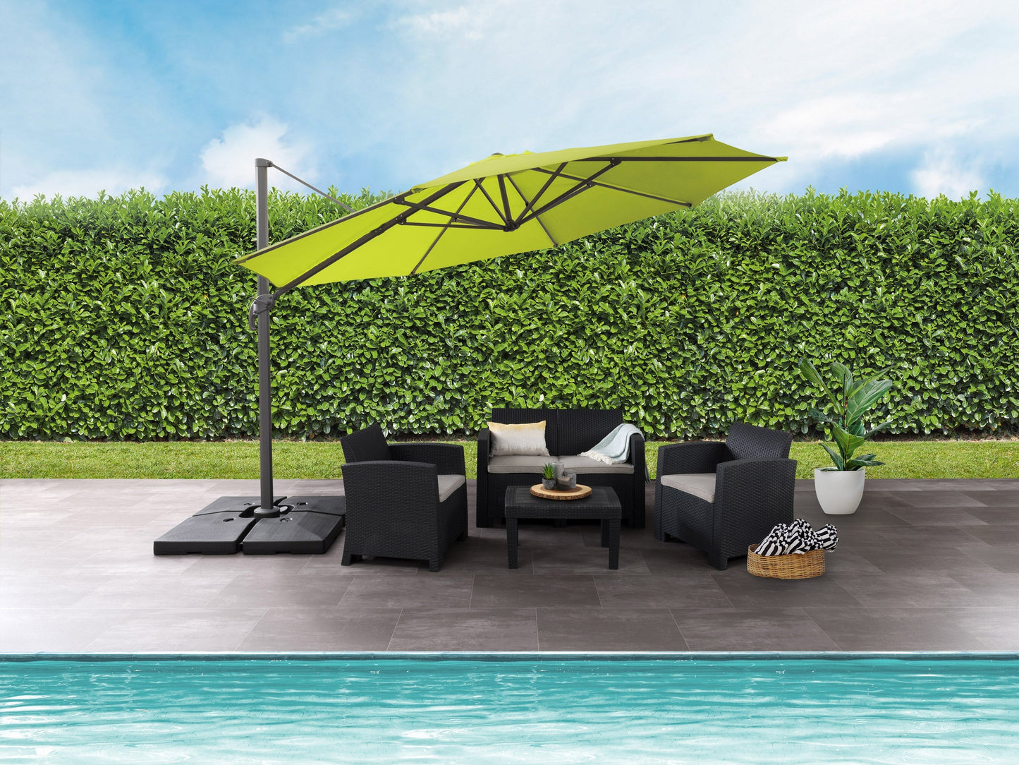 Lime green 11.5ft deluxe offset patio umbrella with sturdy aluminum pole and crank lift system for outdoor shade.