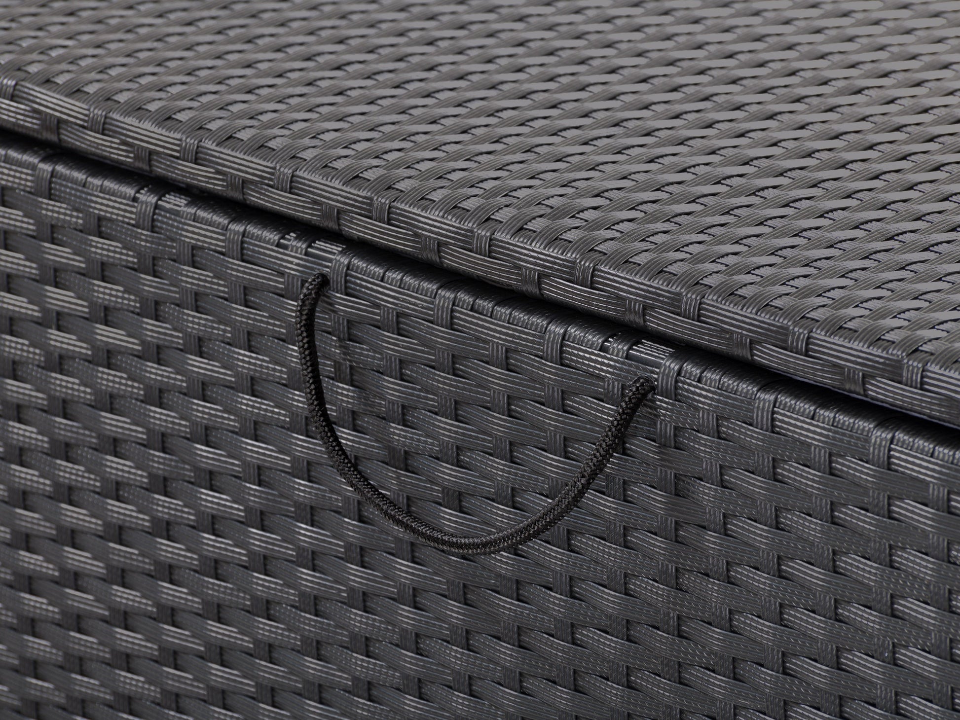 Outdoor wicker patio storage box with a grey finish, weather-resistant materials, and a sleek, modern design.