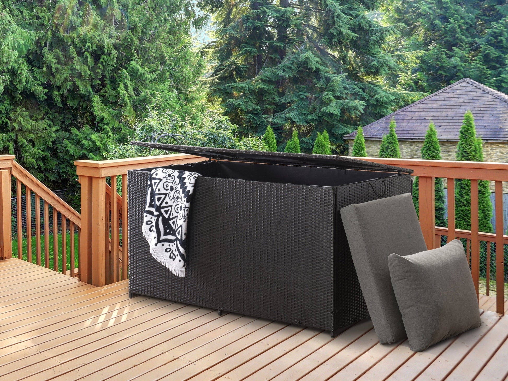 Outdoor grey resin patio storage box with woodgrain texture and lockable lid for garden or deck.