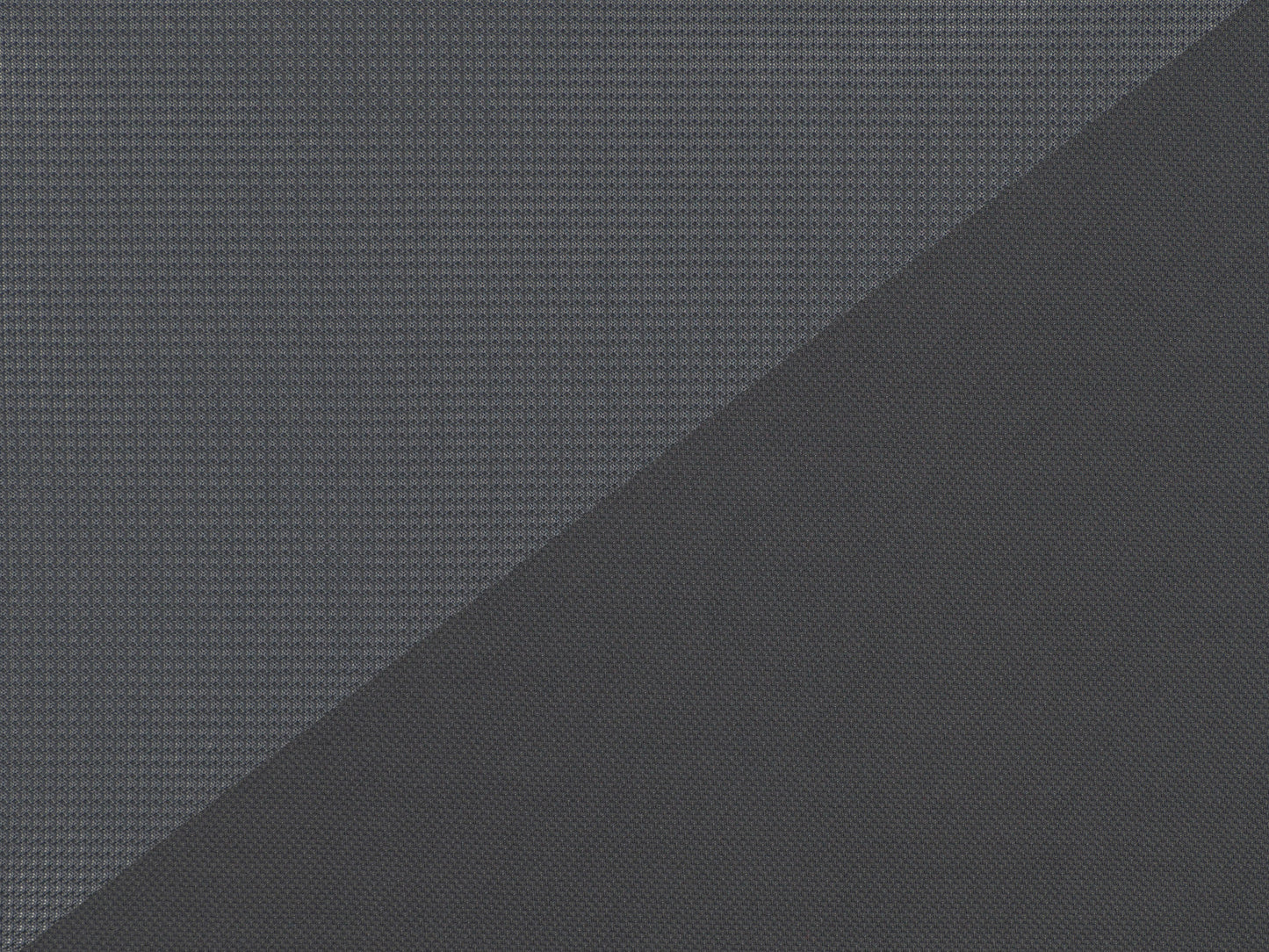 Grey mesh office chair with ergonomic design, adjustable height, and lumbar support.