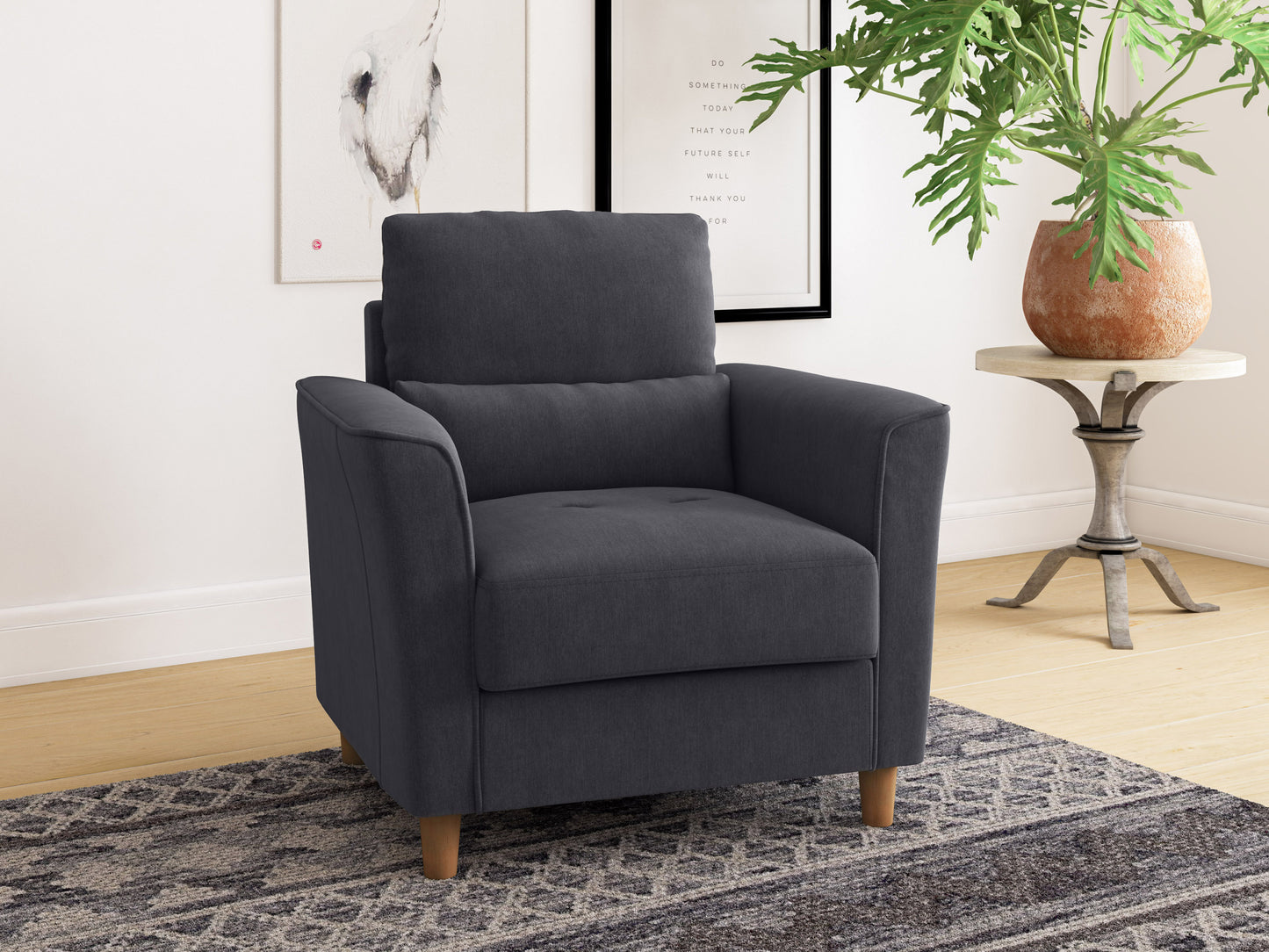 Modern gray fabric armchair with wooden legs, tufted backrest, and cushioned seat, perfect for living room or office decor.