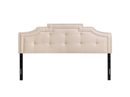 Cream padded king headboard with tufted design, upholstered in soft fabric, perfect for modern bedroom décor.