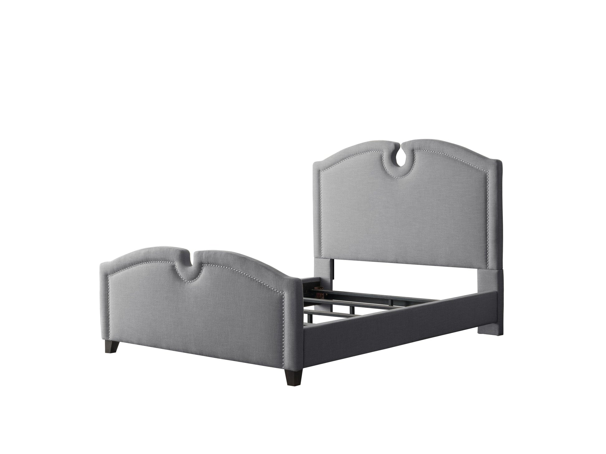 Modern wooden bed frame with light-colored headboard and footboard, featuring a minimalist design and smooth finish, placed in a spacious bedroom with white walls and wooden flooring.
