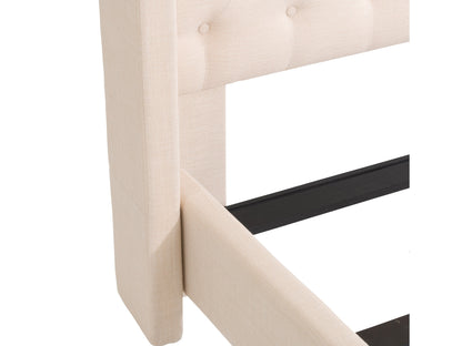Cream tufted queen bed with upholstered headboard, wooden legs, and elegant stitching details.