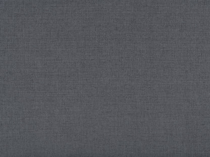 Dark grey adjustable headboard with tufted fabric design and versatile modern style.