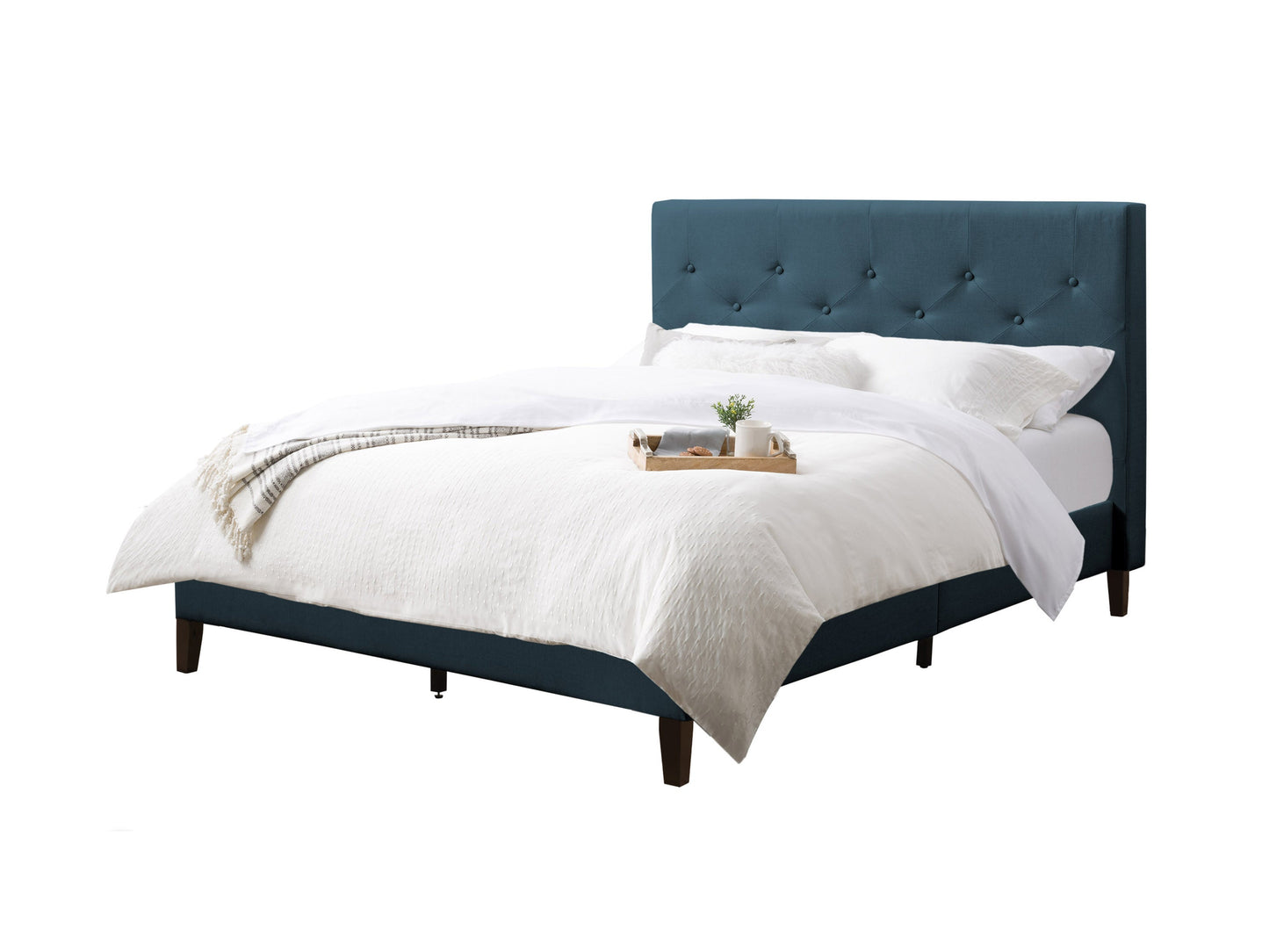 Blue button tufted double/full bed with upholstered headboard and wooden legs.