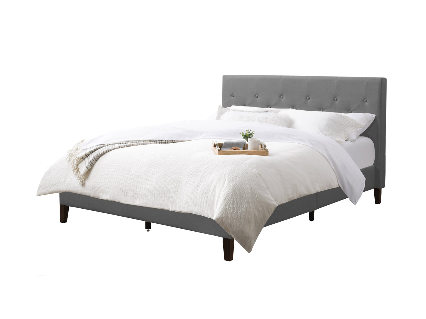 Light grey button tufted queen bed with upholstered headboard and wooden legs.