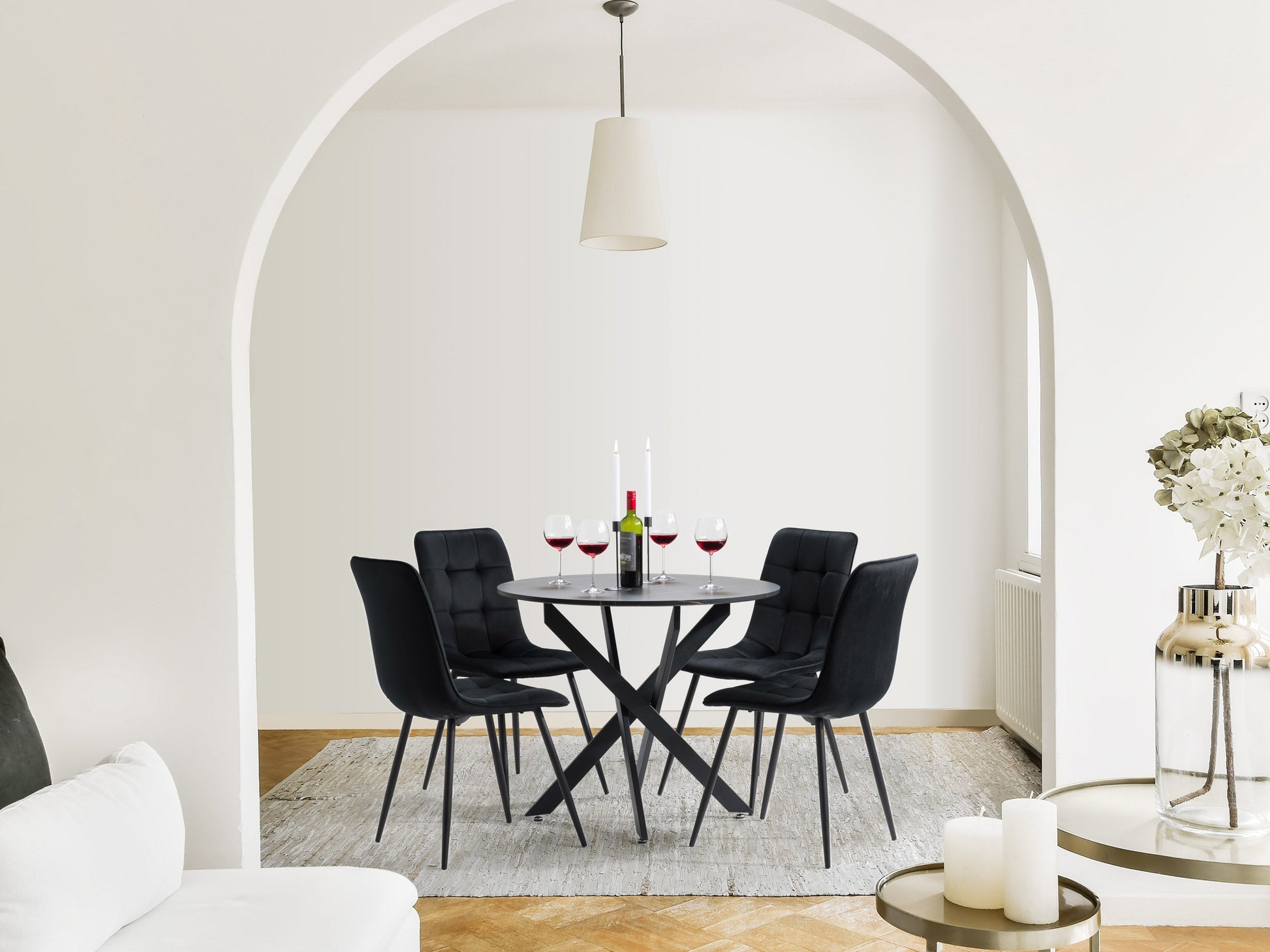 Black dining room set, 5-piece with sleek black chairs and table, modern design, perfect for contemporary interiors.