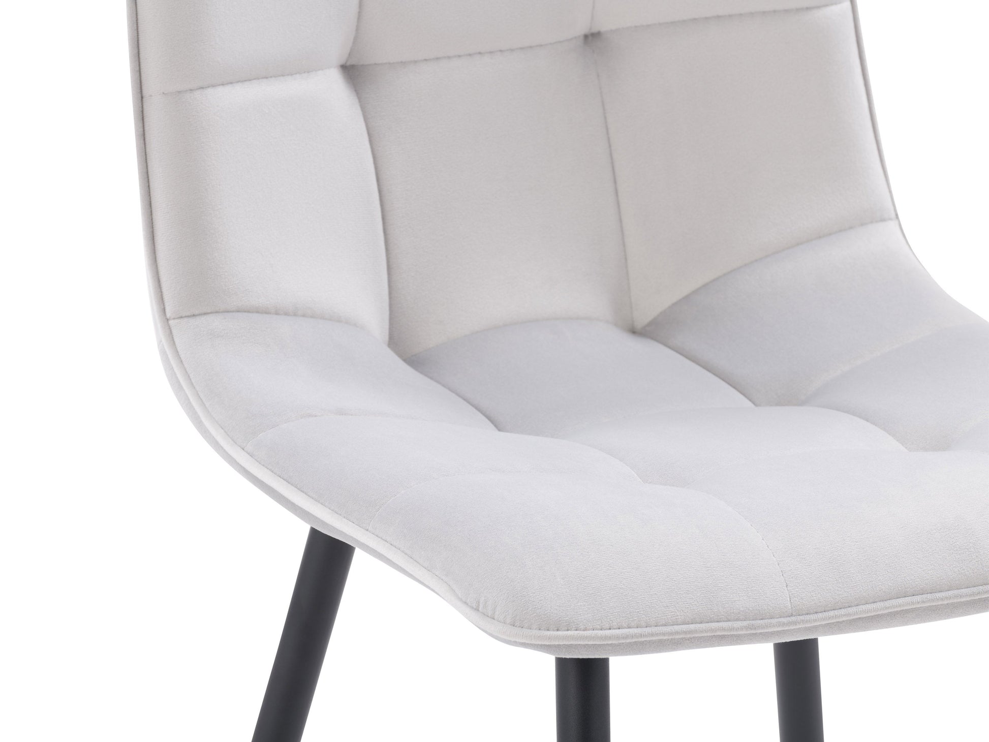 Light grey velvet dining chairs with cushioned seats, sleek black metal legs, and a modern design, set of 2.