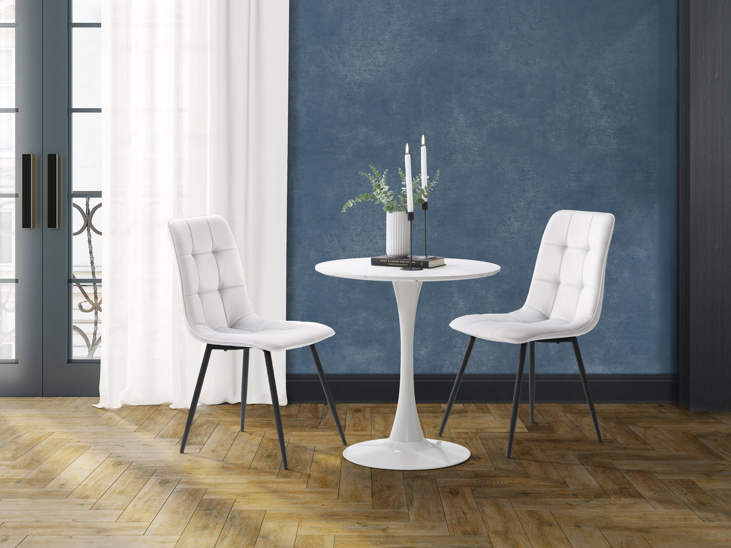 Light grey 3 piece bistro dining set with cushioned seats, round table, and sleek metal legs.