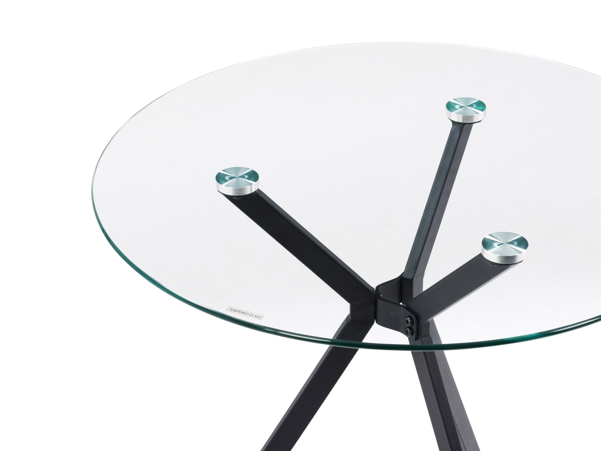 Light grey glass dining table set with four upholstered chairs, sleek modern design, and chrome legs.