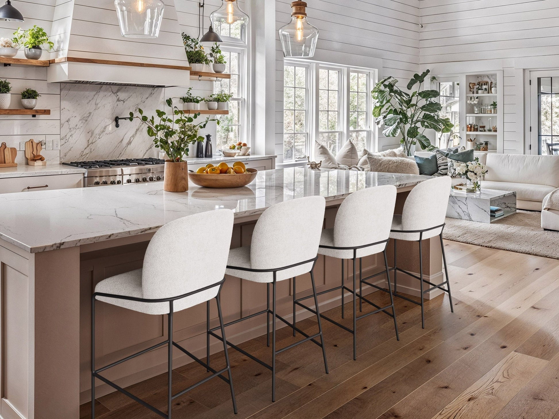 White boucle bar stool with black metal legs, modern design, and plush upholstery.