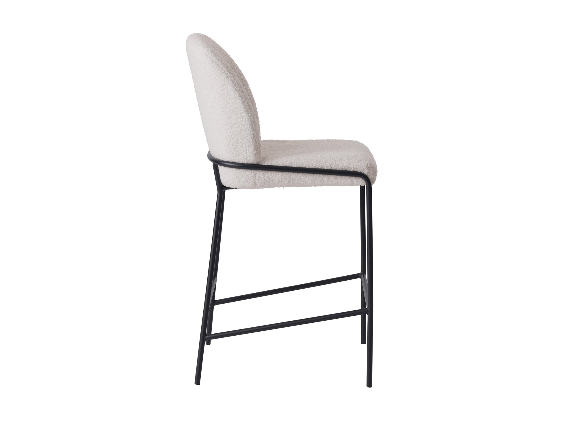 White boucle bar stool with curved backrest, wooden legs, and gold footrest for modern kitchen or bar area.