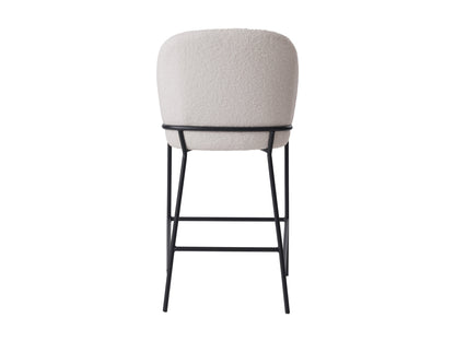 White boucle bar stool with curved backrest, wooden legs, and modern design.