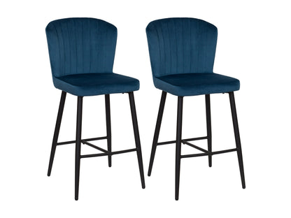 Two blue upholstered bar stools with black metal legs
