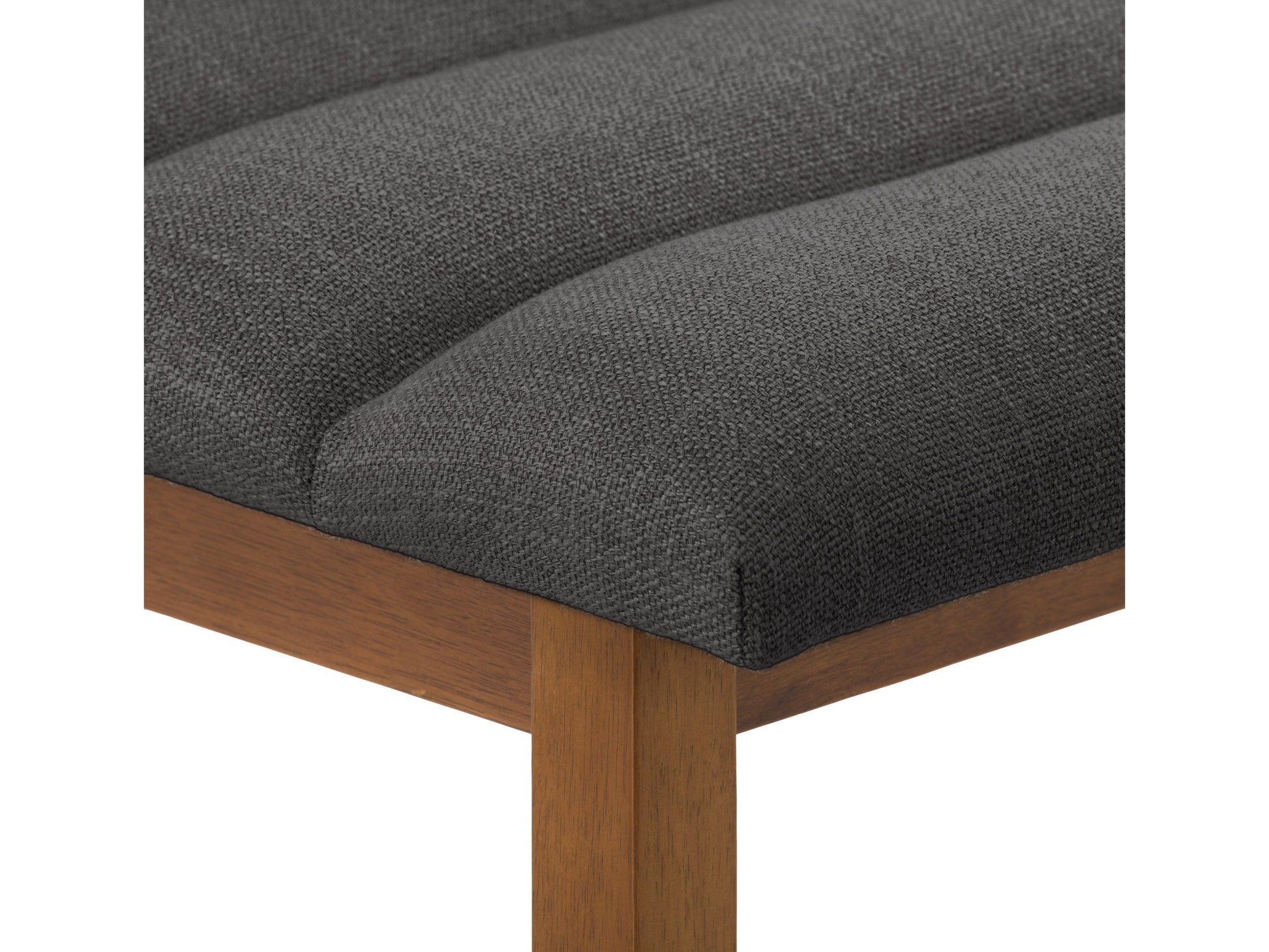 Dark grey channel tufted bar stool with metal legs, modern design, and plush fabric upholstery.