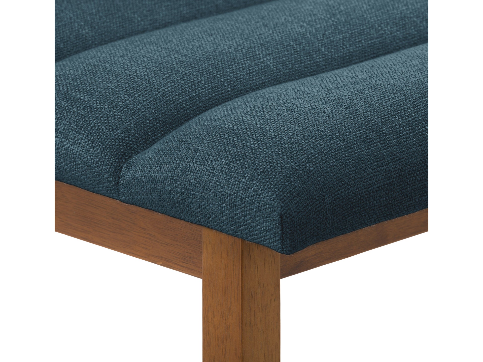 Blue channel tufted bar stool with plush velvet upholstery, gold metal legs, and a contemporary design.