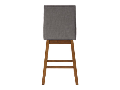 Light grey channel tufted bar stool with wooden legs and cushioned seat, perfect for modern kitchen islands.