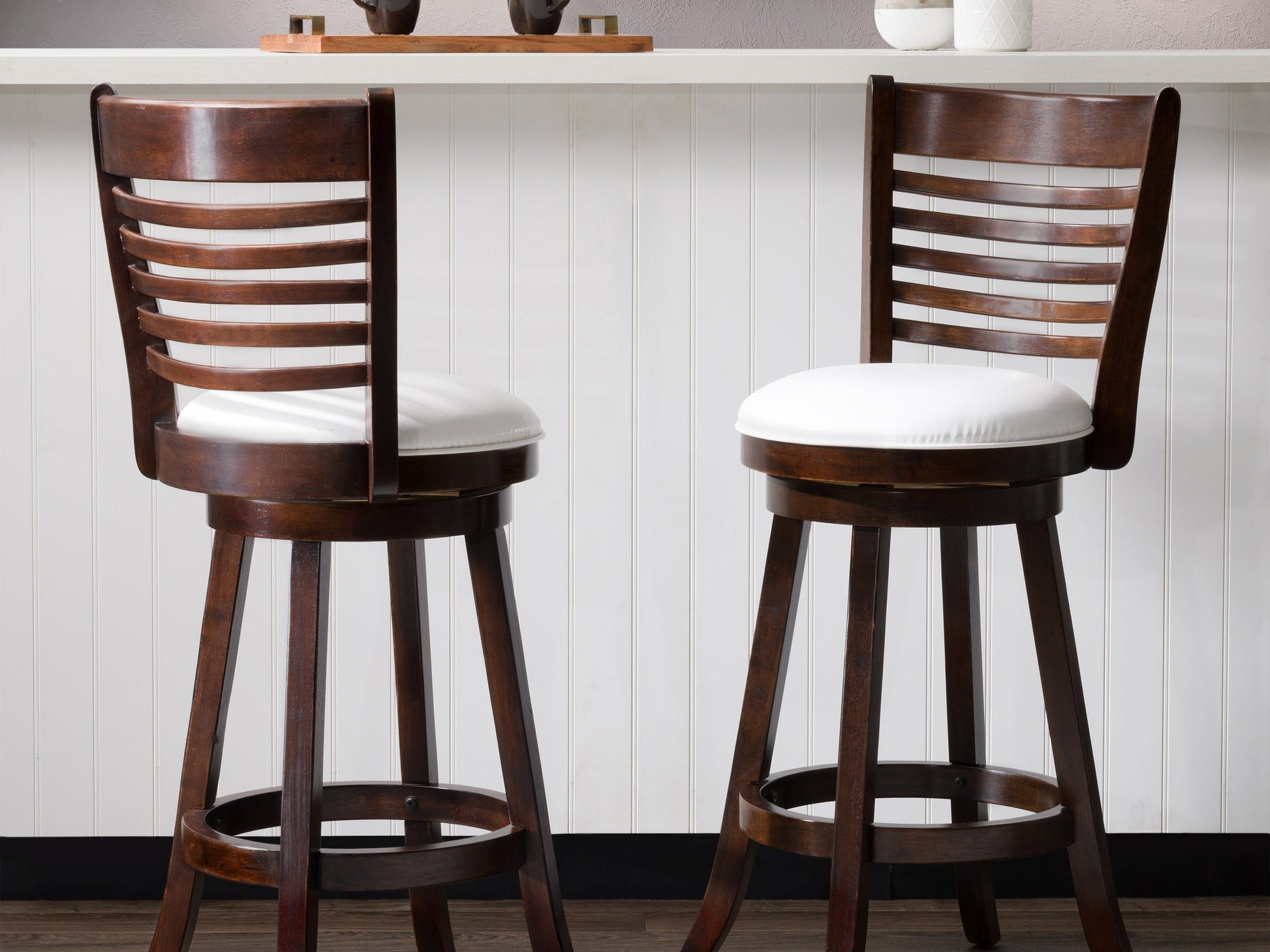 White bar height bar stools, set of 2, with cushioned seats and sleek chrome legs, perfect for modern kitchens or bars.