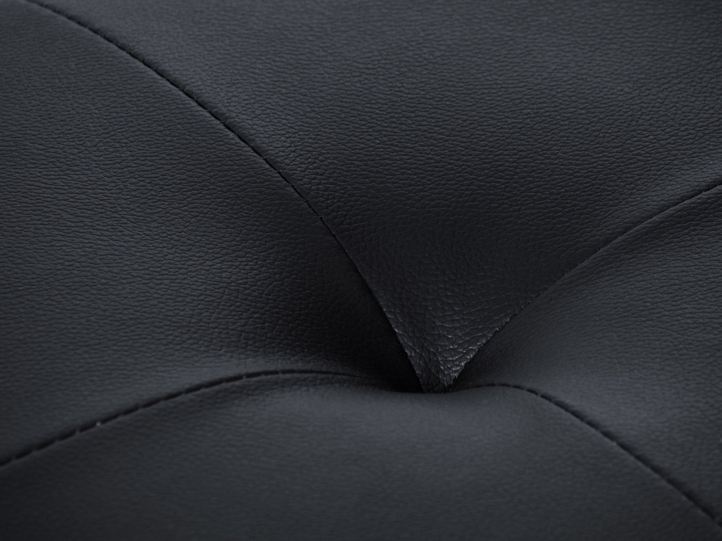 Vegan leather storage ottoman in dark brown with tufted top and hidden compartment.