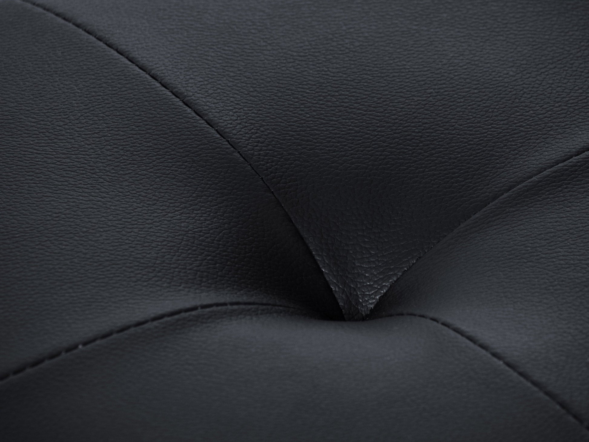 Vegan leather storage ottoman in dark brown with tufted top and hidden compartment.