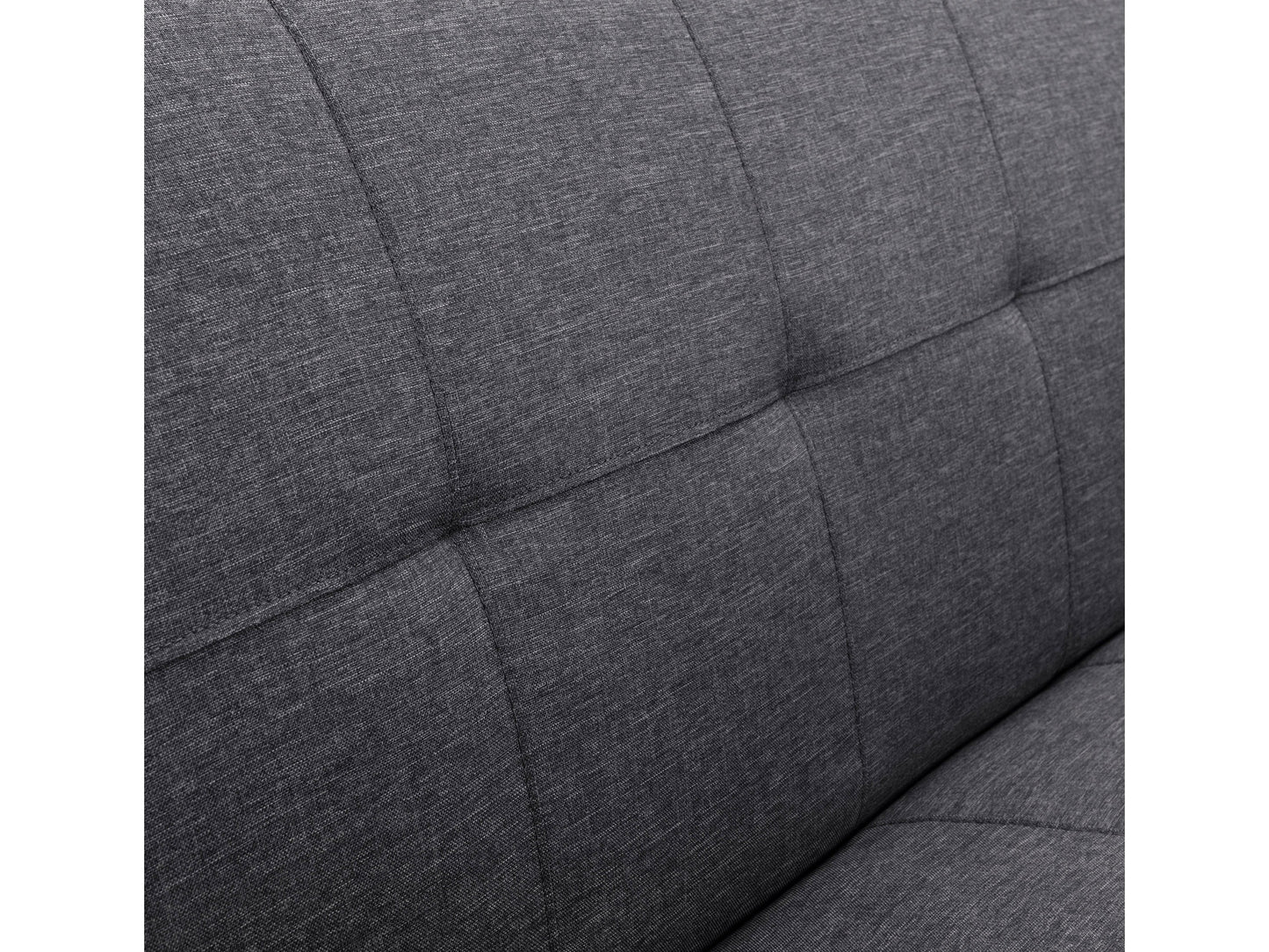 Dark grey futon sofa bed with tufted cushions, wooden legs, and versatile modern design.