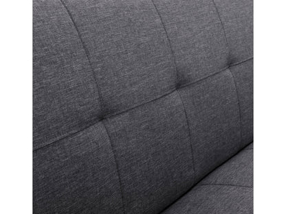 Dark grey futon sofa bed with tufted cushions, wooden legs, and versatile modern design.