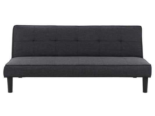 Dark grey futon sofa bed with tufted cushions, wooden legs, and a minimalist design.