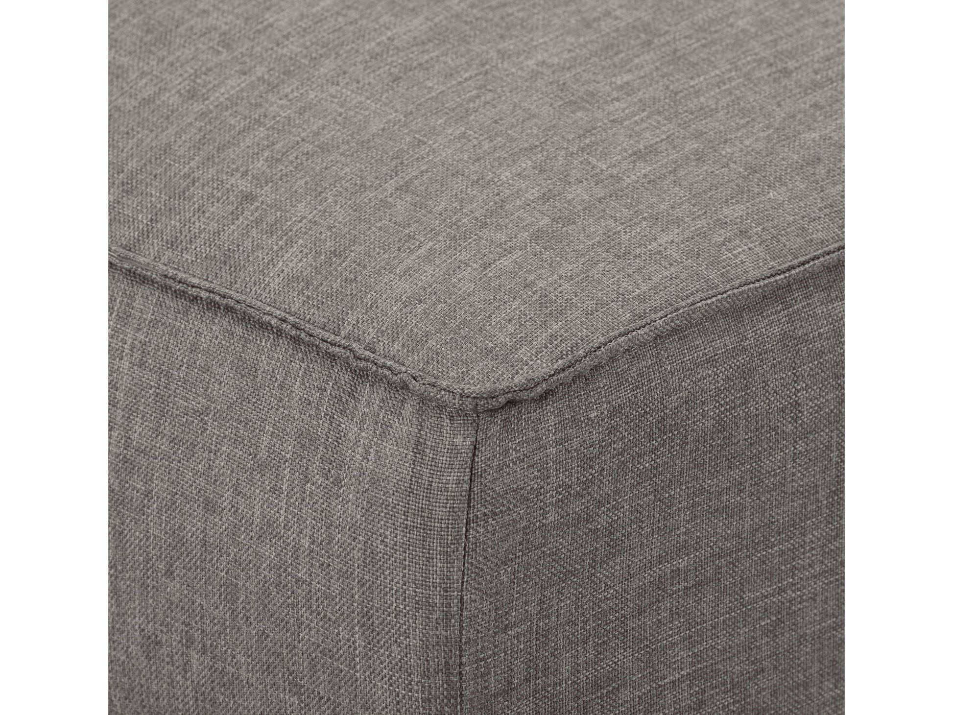 Light grey futon sofa bed with tufted cushions, wooden legs, and a minimalist design.