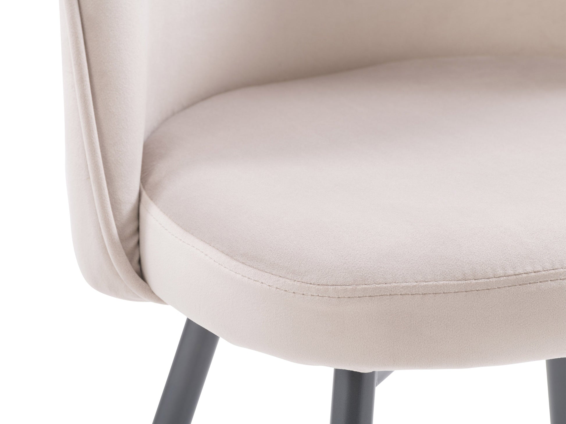 Beige velvet dining chair with curved backrest, gold metal legs, and plush upholstery.