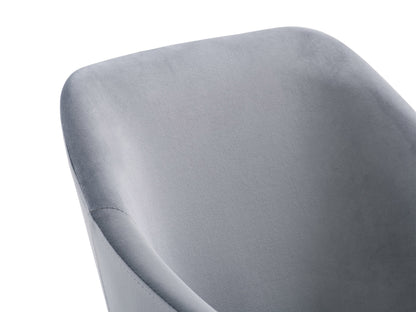 Elegant grey velvet dining chairs set with gold metal legs, tufted backrest, and modern design.