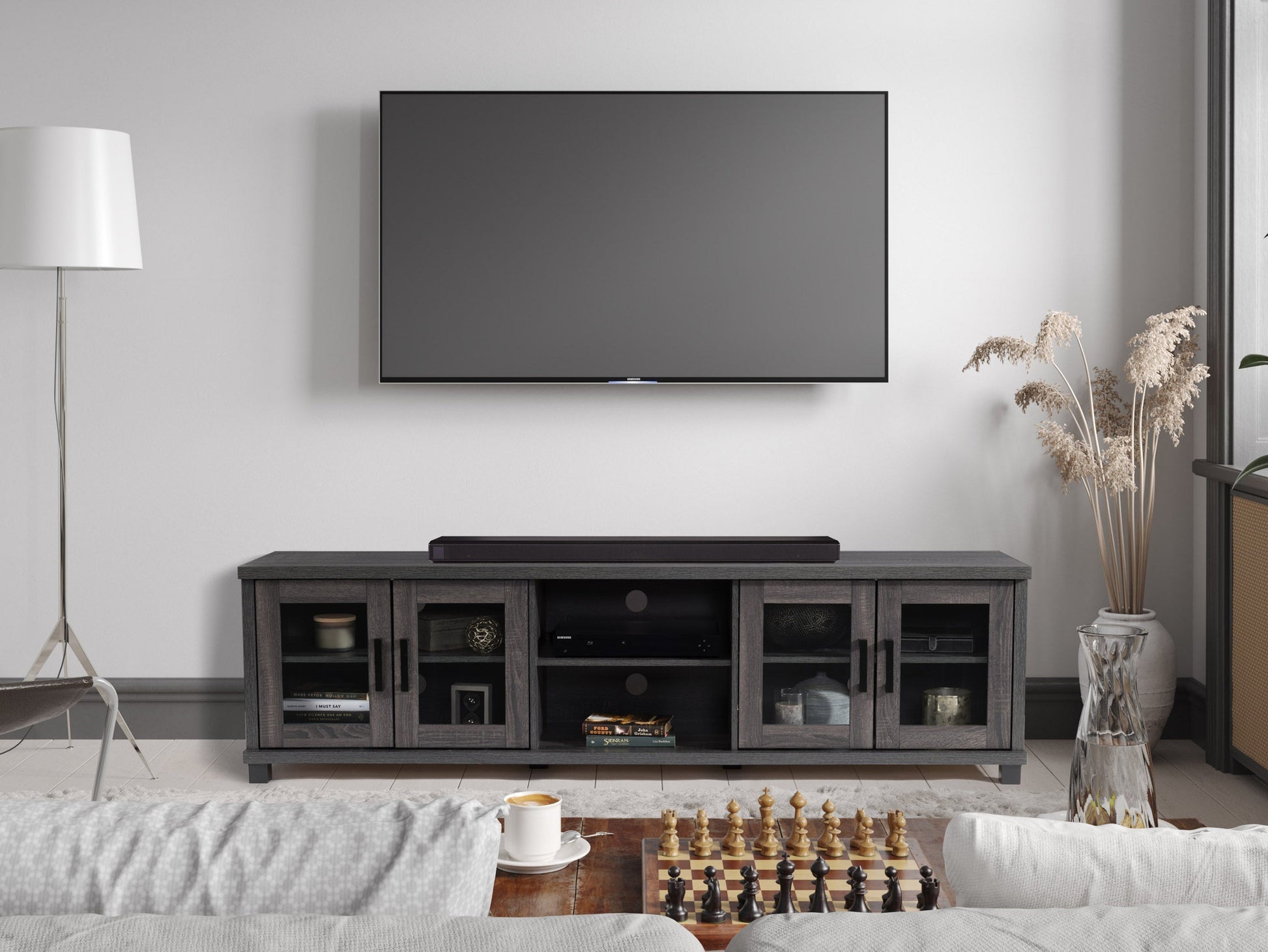 Dark grey TV stand for 95-inch TVs with sleek design, ample storage, and sturdy wooden construction.