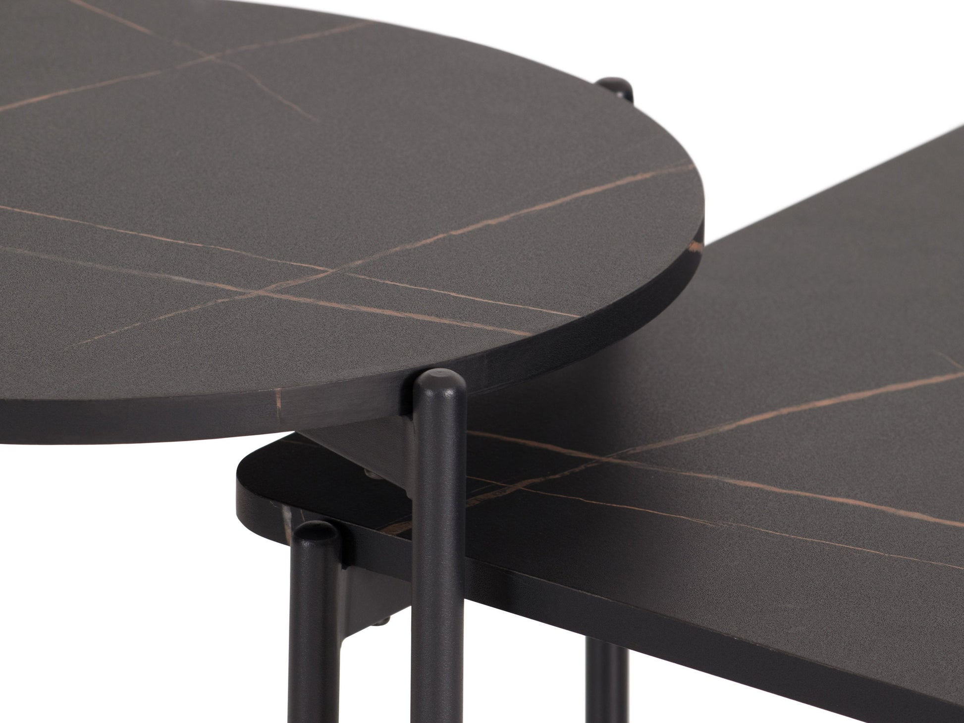 Black marble coffee table set with gold metal frame, sleek design, and modern aesthetic.