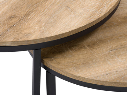 Light wood round nesting coffee tables with metal legs, minimalist design, and smooth finish.