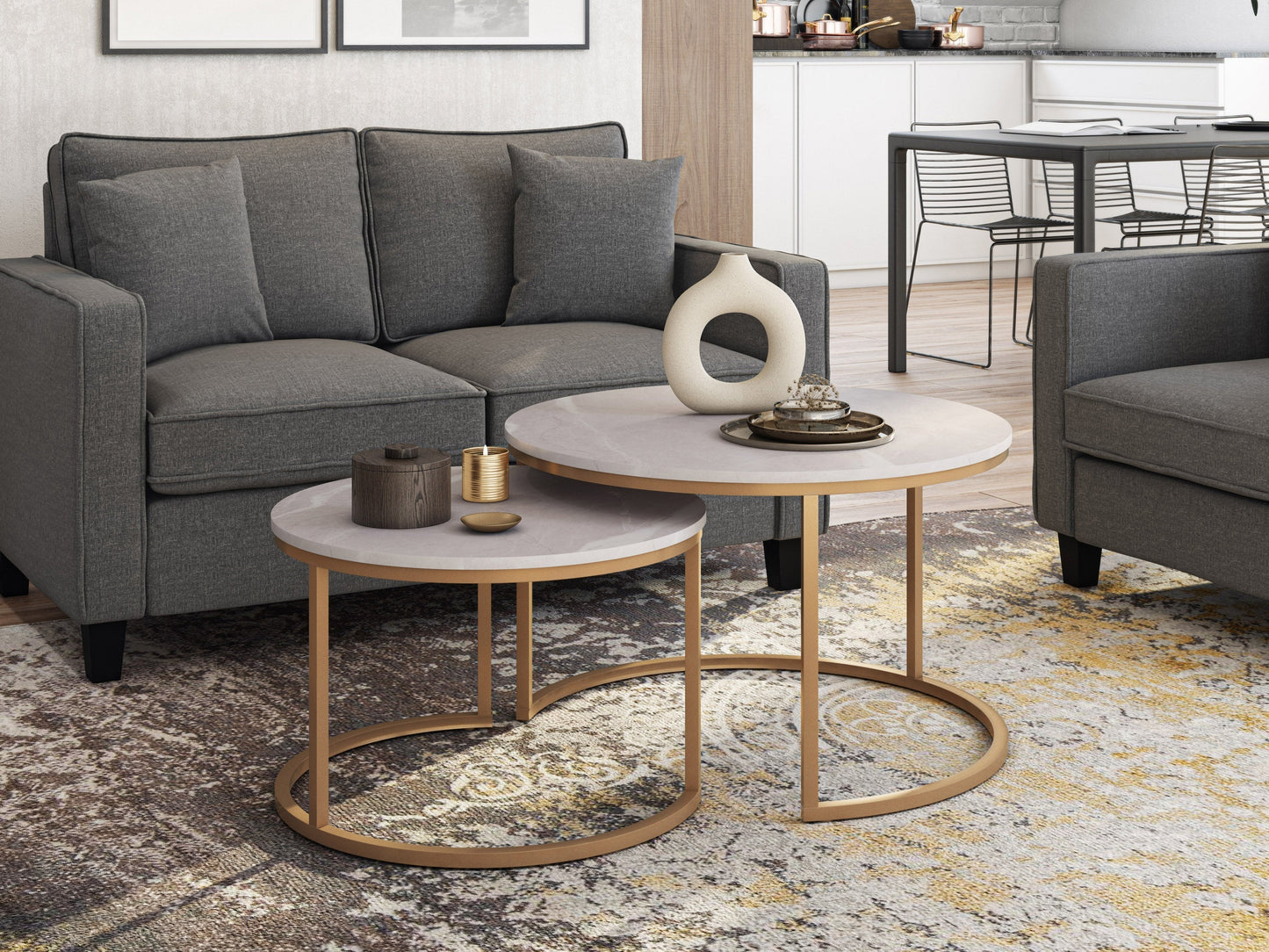 Round nesting coffee tables with marble tops and gold metal frames, modern and elegant design for living rooms.