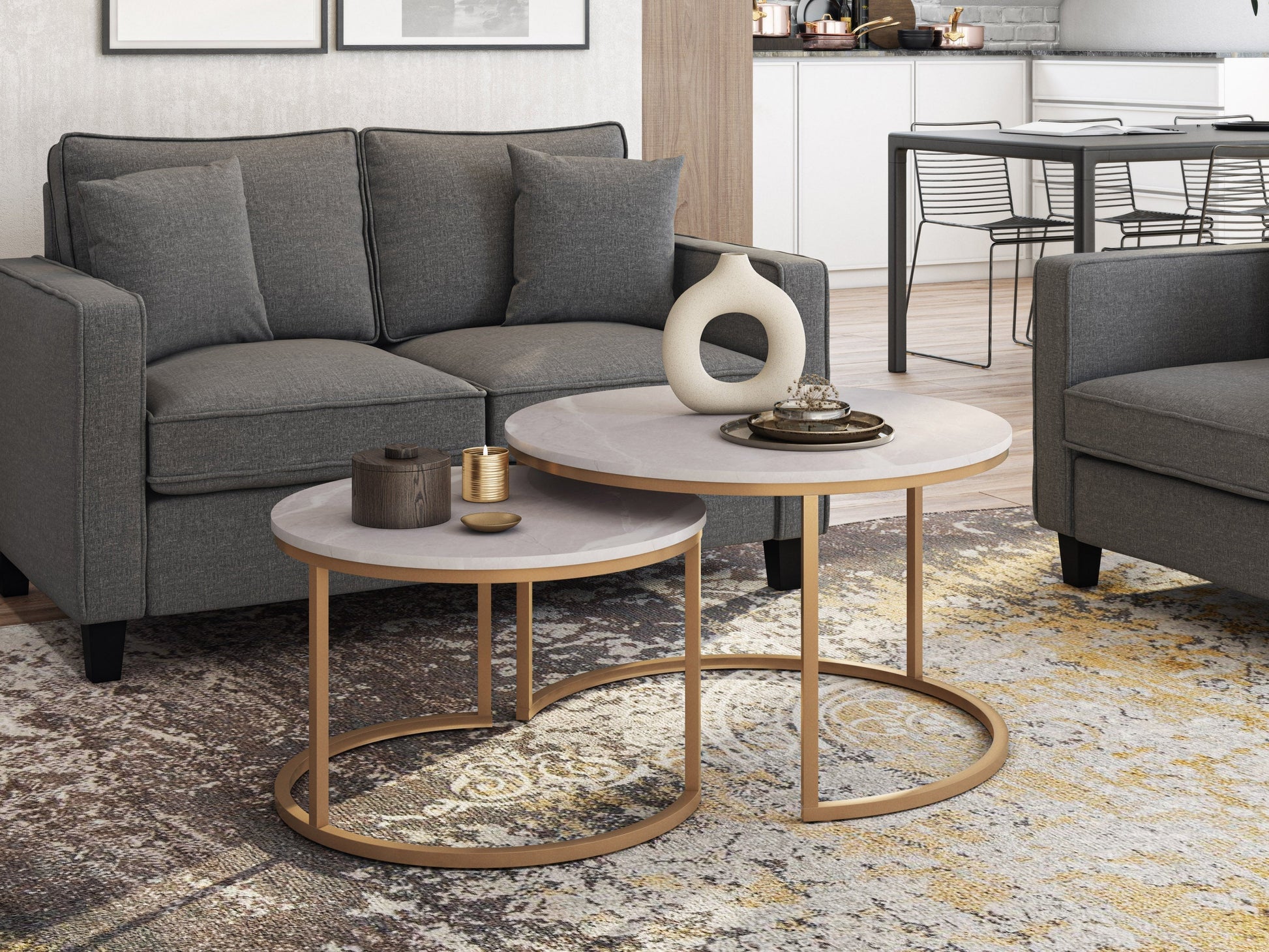 Round nesting coffee tables with marble tops and gold metal frames, modern and elegant design for living rooms.