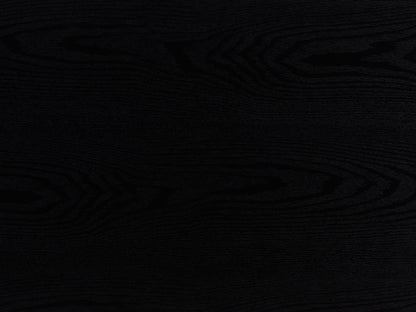 Black fluted coffee table with sleek cylindrical design and modern minimalist style.