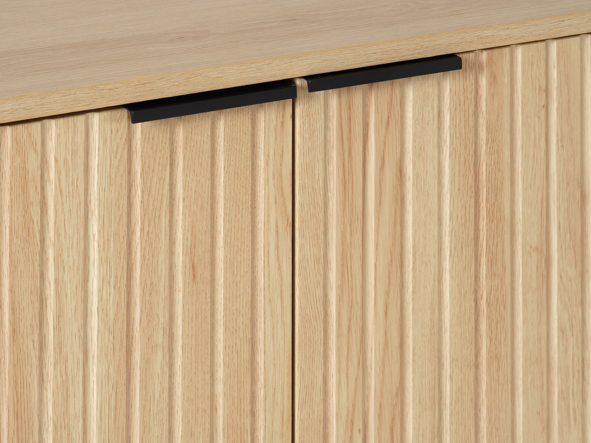 Light wood sideboard with sleek black metal legs, featuring spacious storage drawers and a minimalist design.
