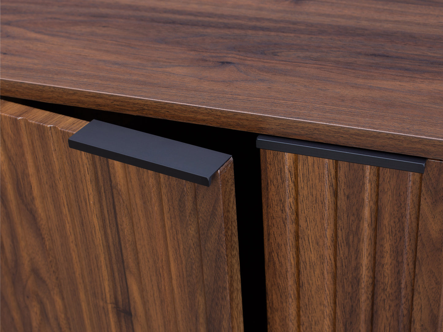 Fluted Walnut Sideboard Cabinet with mid-century design, featuring vertical fluted detailing, rich walnut finish, sleek metal handles, and spacious storage compartments.