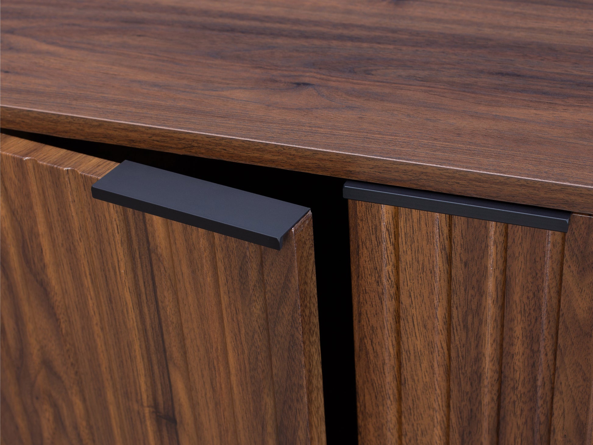 Fluted Walnut Sideboard Cabinet with mid-century design, featuring vertical fluted detailing, rich walnut finish, sleek metal handles, and spacious storage compartments.