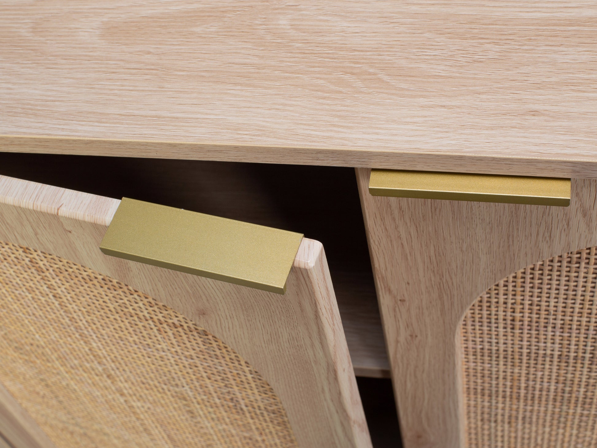 Rattan sideboard cabinet with natural woven rattan doors, smooth wooden frame, and metal handles, featuring a sleek, minimalist design ideal for modern living spaces.