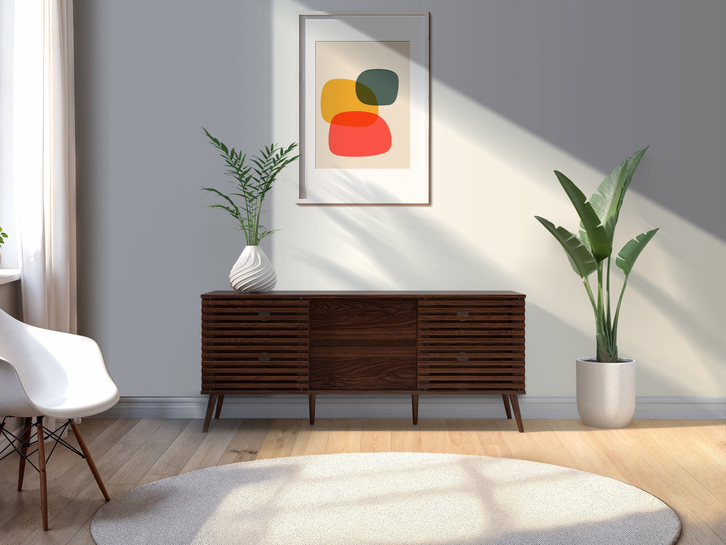 Walnut sideboard console with sleek design, featuring a rich brown finish, three drawers, two cabinets with silver handles, and sturdy legs. Ideal as a TV stand or storage unit in modern living rooms.